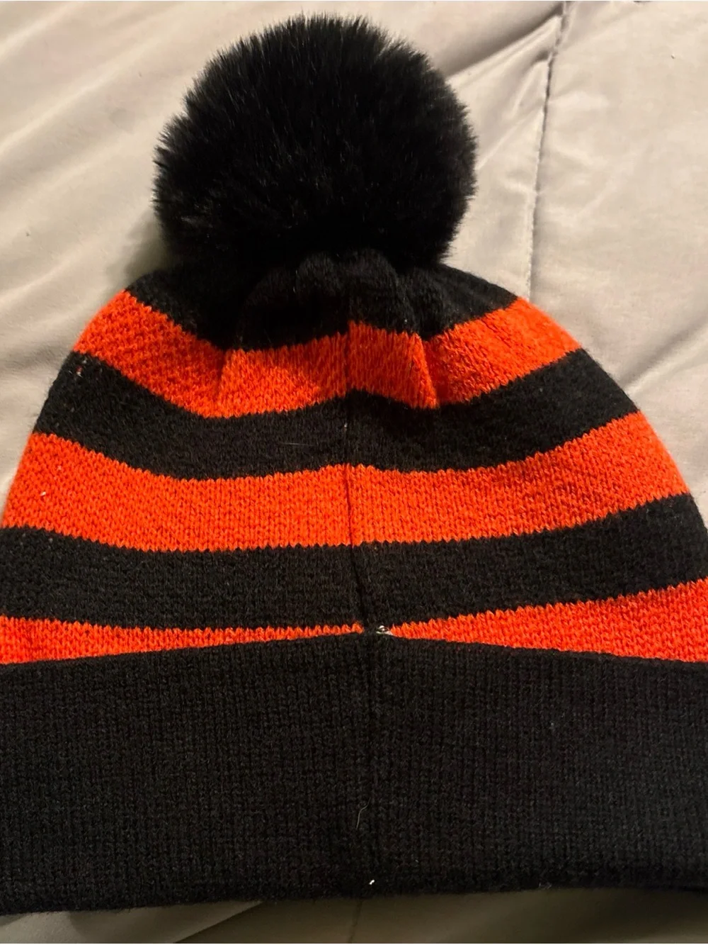 Black & Orange Pom Pom Skull Beanie